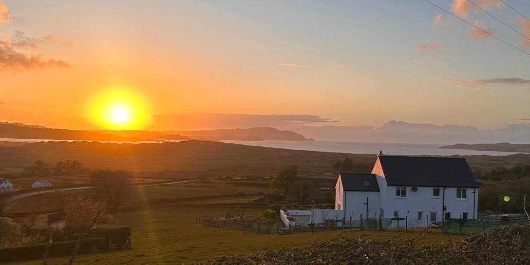 Sunset over Donegal countryside and coast